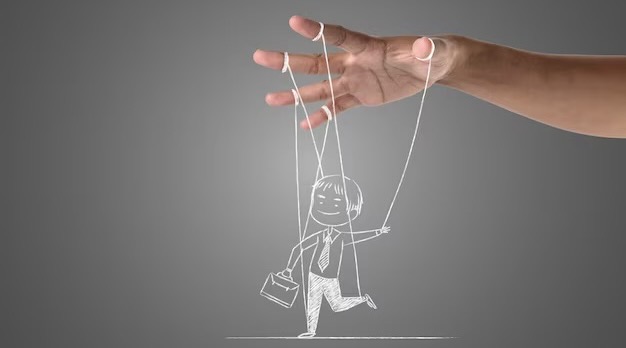 The hand controls the figure using drawn threads